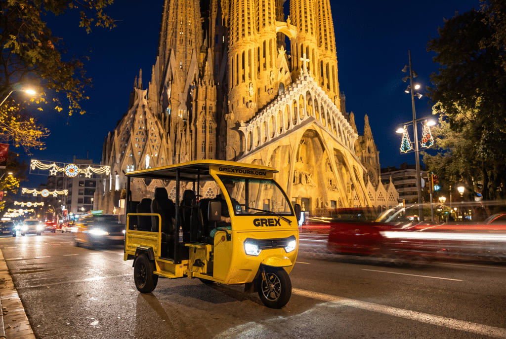 Tuk-tuk in front of the Sagrada Família at night in December