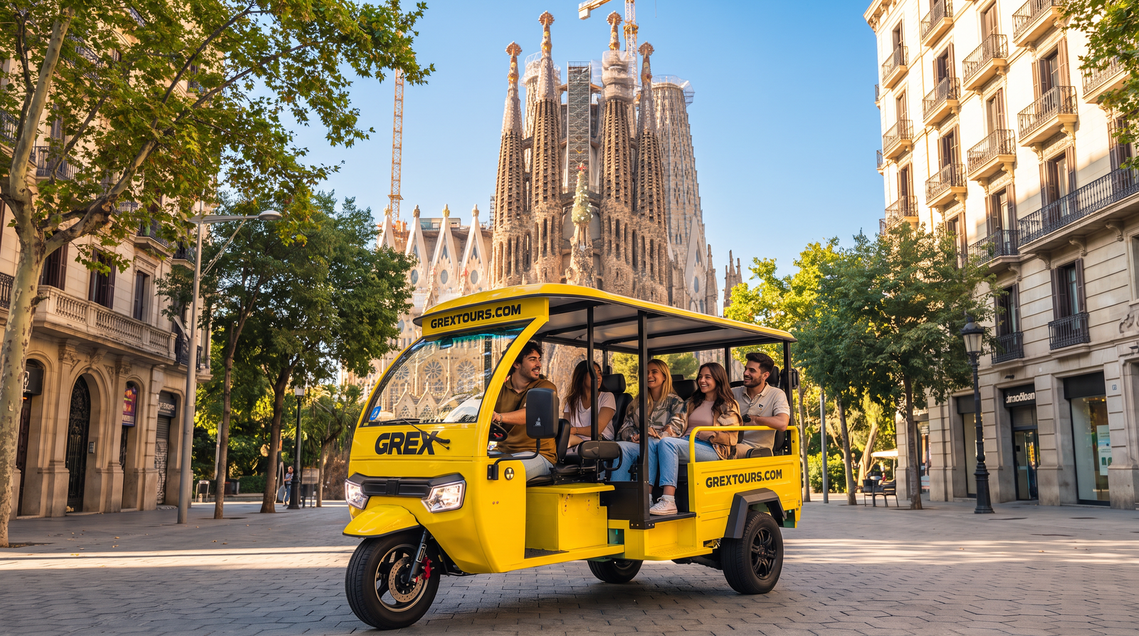 Barcelona in one day: private GREX tuk-tuk passing the Sagrada Família